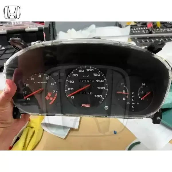 Rare piece for 96-00 Civics  mint FERIO RS gauge cluster. Zero fade, no scratches, nothing. Functions perfectly! This will work in auto and manual 96-00 Civics. Lights up Amber as well
