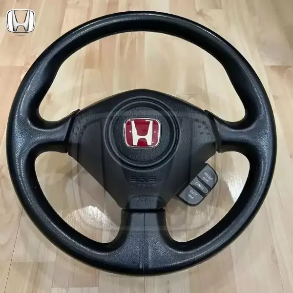 S2000 AP2 Steering Wheel with red H emblem.