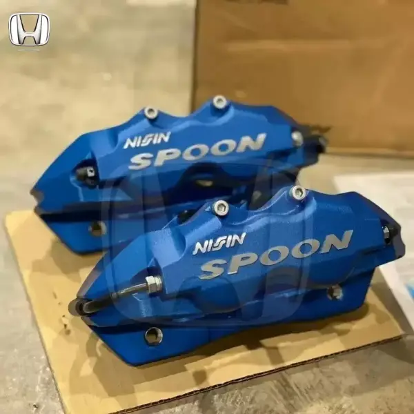 Spoon twinblock block set brand new.  Spoon Caliper is able to install to all Honda models because hub bolt are the same, 140mm, but this set needs at least 16