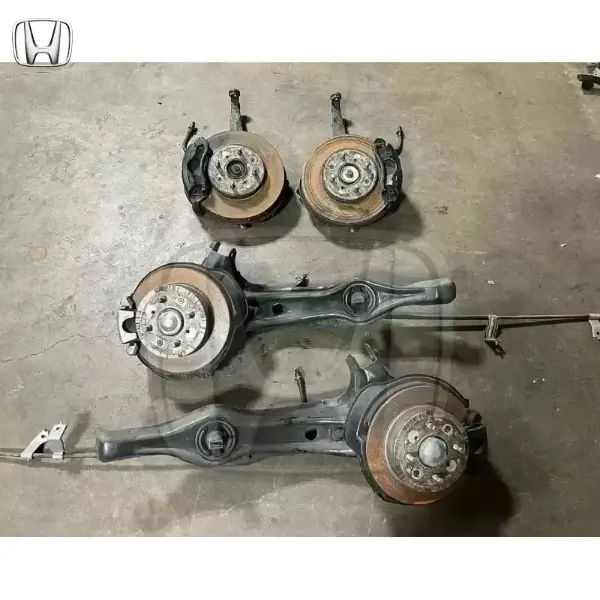 Em1 Civic Si Front spindles and rear discs brakes.�Trailing arm bushings were recently replaced and in great shape.�Blox extended front lower ball jointsEverything is in good working condition. Just removed from a Ek civic hatch.